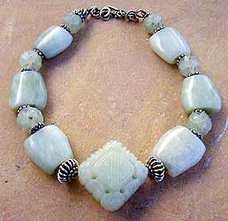 Carved serpentine and sterling silver necklace by Vicky Jousan