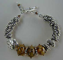 Lampwork Beads and Sterling silver bracelet by Vicky Jousan